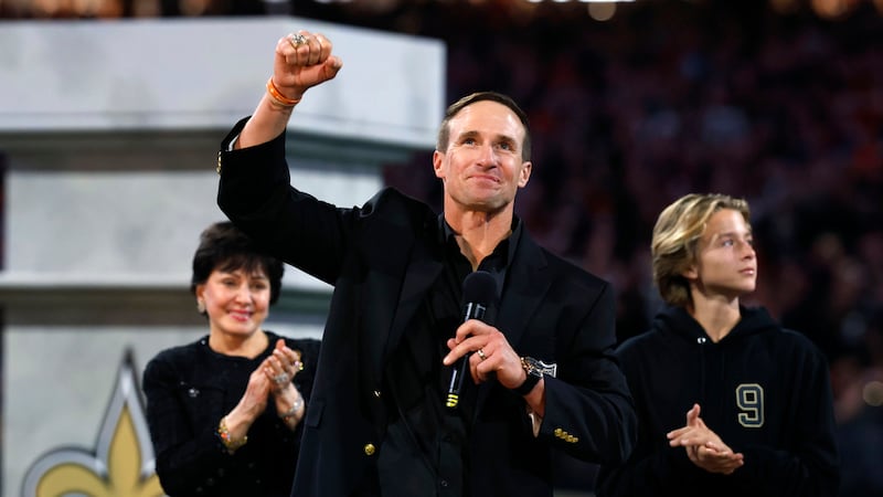 Former New Orleans Saints quarterback Drew Brees celebrates his induction in the Saints Hall...